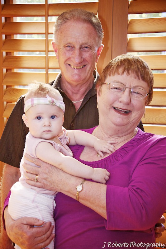 Baby girl with grandparents - family portrait photography sydney